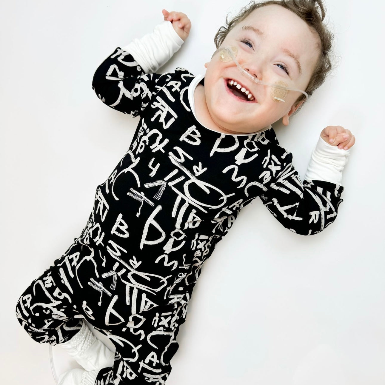 Alphabet for Autism Adaptive Tube Access Day to Night Romper