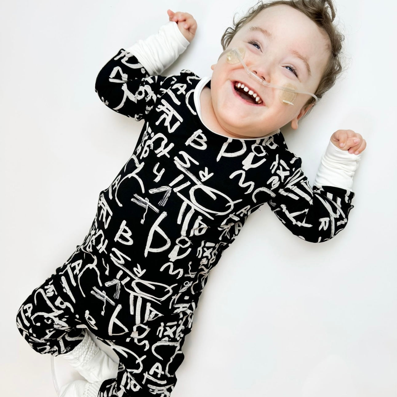 Alphabet for Autism Adaptive Tube Access with snaps Kid's Day to Night Romper